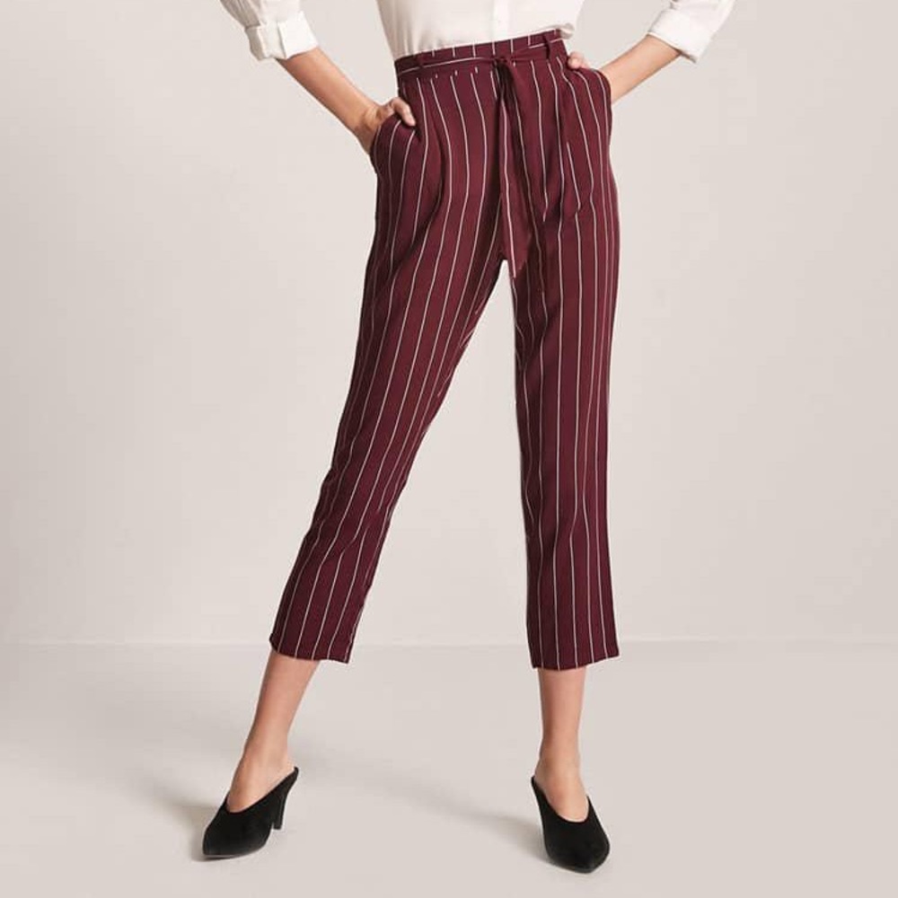 Burgundy ankle woven pants with cream strips. Also comes with pockets.